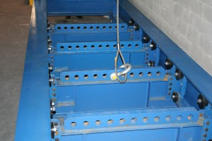 The lower connection points are four (4) free floating beams which can combined into any configuration to suit the test piece attachments points.